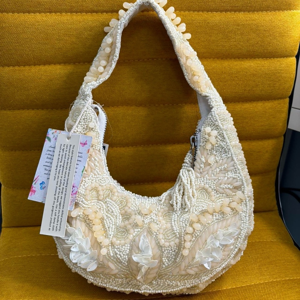TJ Maxx Marshall’s viral white Pearl floral Beaded bead Shoulder Bag sequins